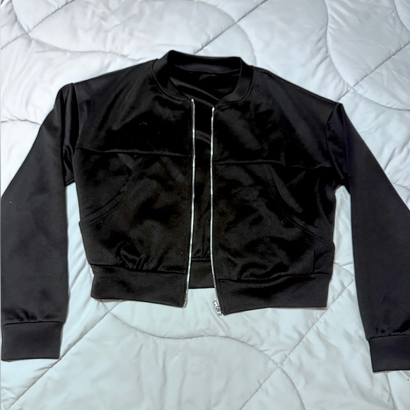 Adult small black zipper jacket. Never used. No tags. - Picture 1 of 2